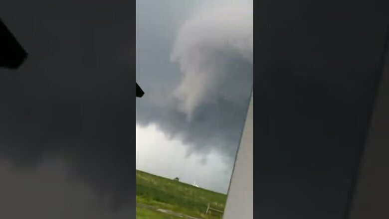 Mowing the lawn during a tornado