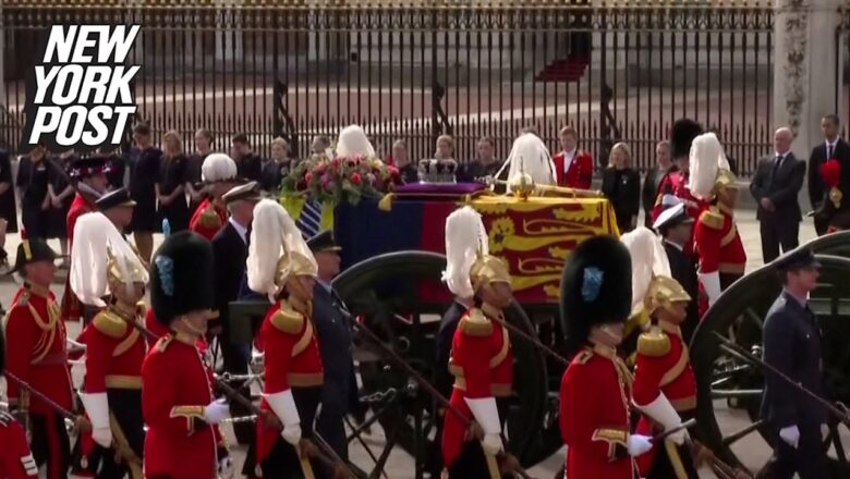 Raw: Queen Elizabeth’s coffin journeys to final resting place | New York Post