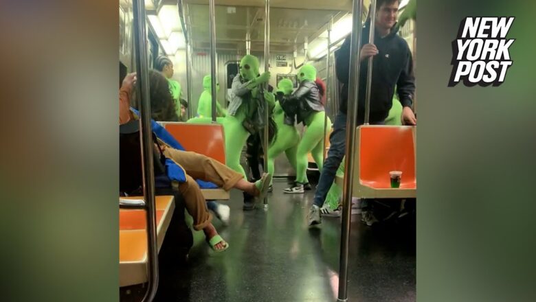 VIDEO: Female menaces in bizarre neon leotards attack Times Square straphangers | New York Post