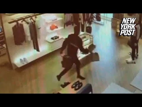 Raw Video: Man knocks himself out trying to flee store with luxury stolen goods | New York Post