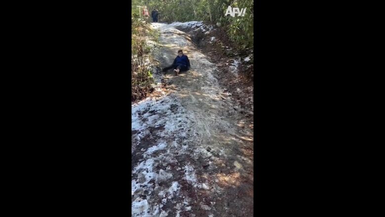 It knocked his socks SHOES off! ?? #fail #winter #sled #funny #afv #shorts #afvfam