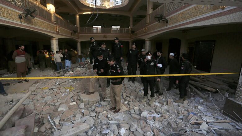 100 people confirmed dead in Pakistan mosque suicide bombing