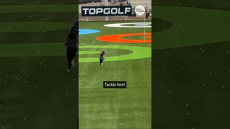 Toddler chased down after running onto Topgolf driving range | USA TODAY #Shorts