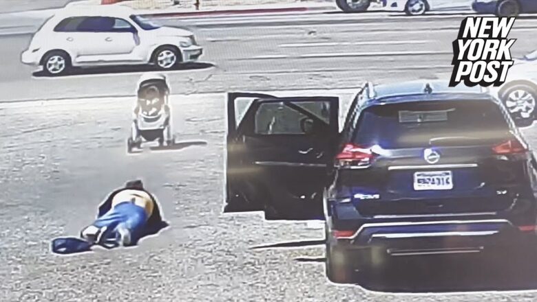 Heart-pounding video shows man stopping baby in stroller from rolling onto busy highway | NY Post