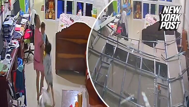 Mom runs back and saves her baby seconds before ceiling collapses above them in daring video