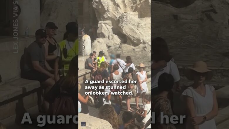 Tourist walks across Trevi Fountain in Rome to fill up water bottle #Shorts