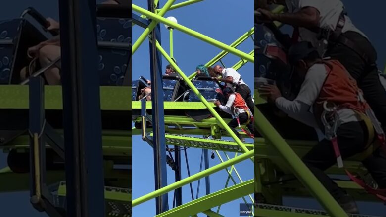 Stranded roller coaster car pushed down the tracks by ride operators #Shorts