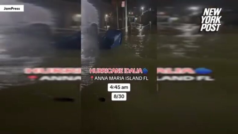 Woman swimming through hurricane Idalia-flooded Florida street caught on video