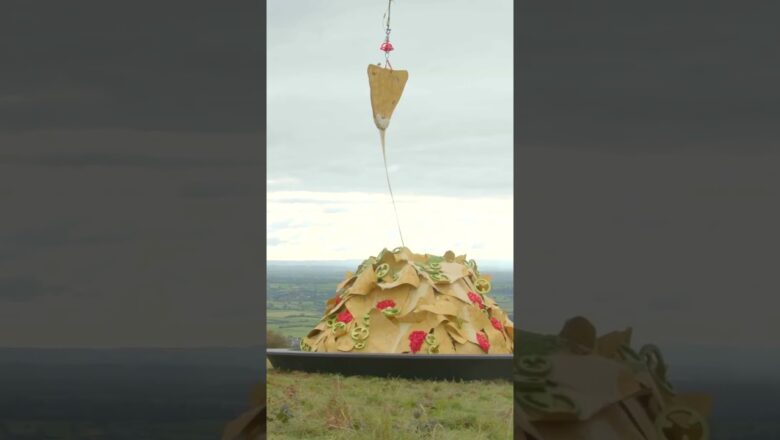 World’s highest cheese-pull as chopper lifts chip 50 feet into air: ‘Nacho everyday stunt’ #shorts