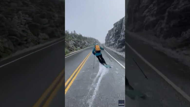 A light snowfall was just enough for two skiers to glide down a road #Shorts