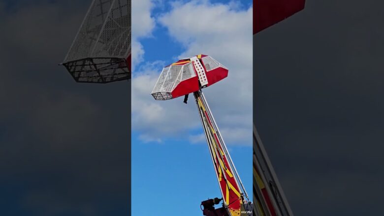 Carnival ride operator left dangling in the air after strong winds sent ride car into air #Shorts