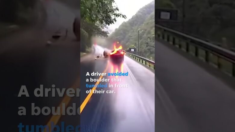 Quick-thinking driver swerves to avoid boulder plummeting onto road #Shorts
