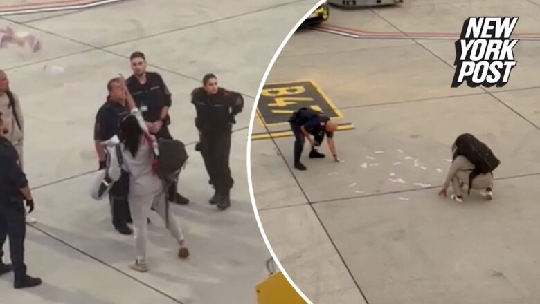 Wild video shows ‘unruly’ airline passenger throw $6,000 on tarmac after refusing to pay for upgrade