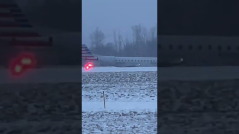 Passengers evacuate after plane slides on icy landing #Shorts