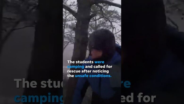 Watch: Snowy helicopter rescue of stranded college students #Shorts