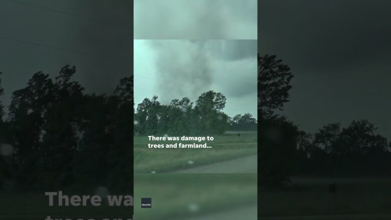 Watch as storm chasers follow a forming tornado that damages farmland #Shorts