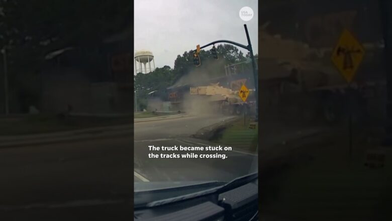 Terrifying moment train slams into truck hauling tank #Shorts