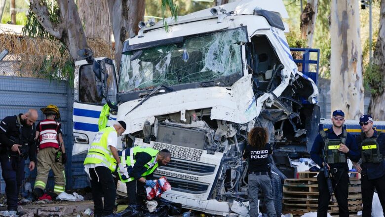 One killed, dozens hurt after truck plows into crowded bus stop in Israel