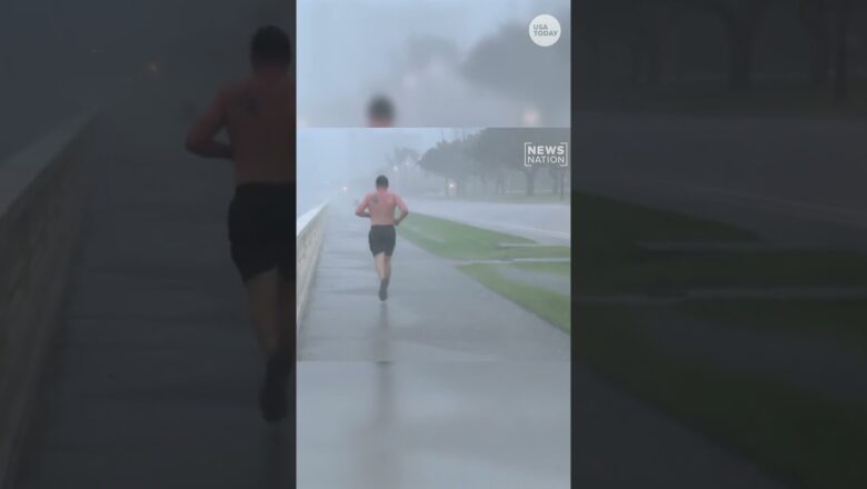 Unbothered Florida man jogs through Hurricane Milton broadcast #Shorts