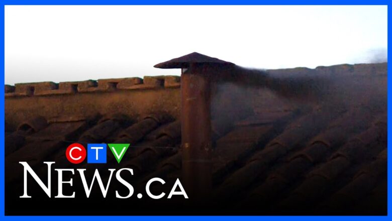 CONCLAVE | Watch the moment black smoke emerges from the Sistine Chapel chimney