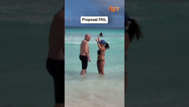 The wave said no but she said yes! 💍 #afv #proposal #fail #shorts