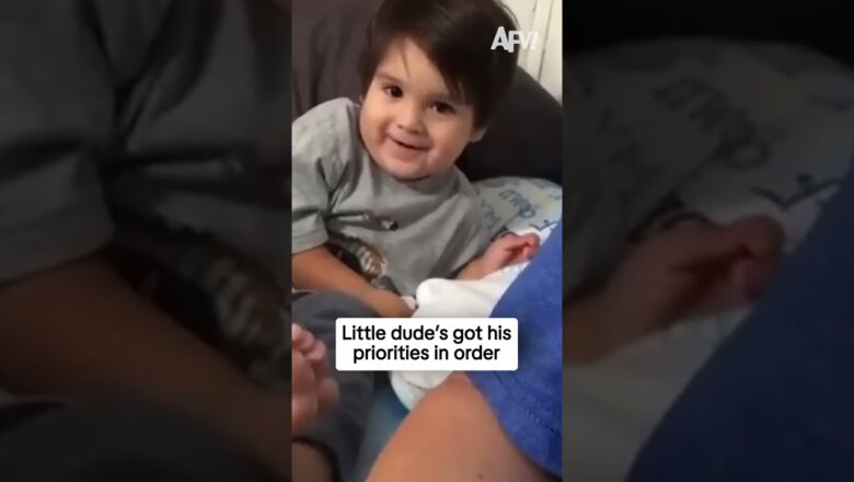 Little dude’s got his priorities in order