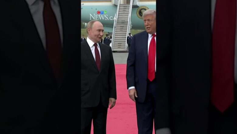 Putin appears to gesture he can’t hear question about killing civilians