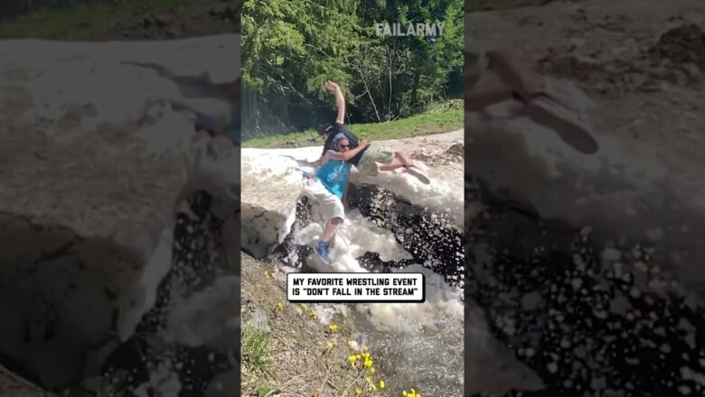 Guy Falls Into Stream While Trying To Throw Friend Into It