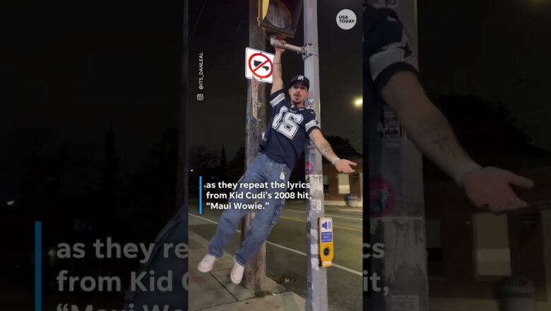TikTokers hang on street signs for viral Kid Cudi trend #Shorts