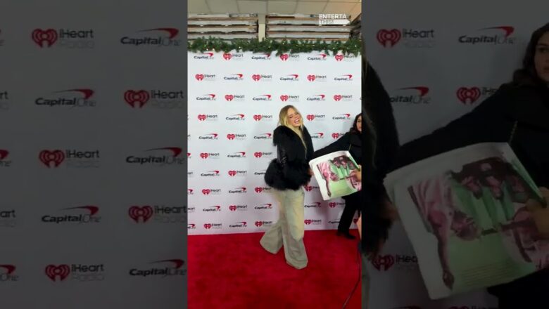 Reneé Rapp struts down Jingle Ball red carpet and reacts to USA Today front page