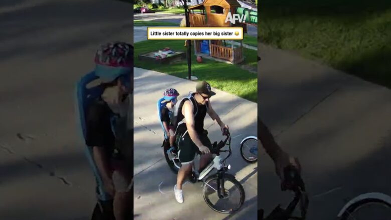 Little sister totally copies her big sister 😂