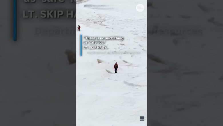 Slippery ice shelf along Lake Michigan sends people sliding