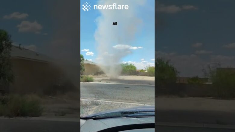 Huge Dust Devil Forms Outside Mans House