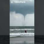 Insane Tornado Looms Over The Ocean