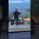 Unicyclist Stops Traffic To Show Off His Juggling